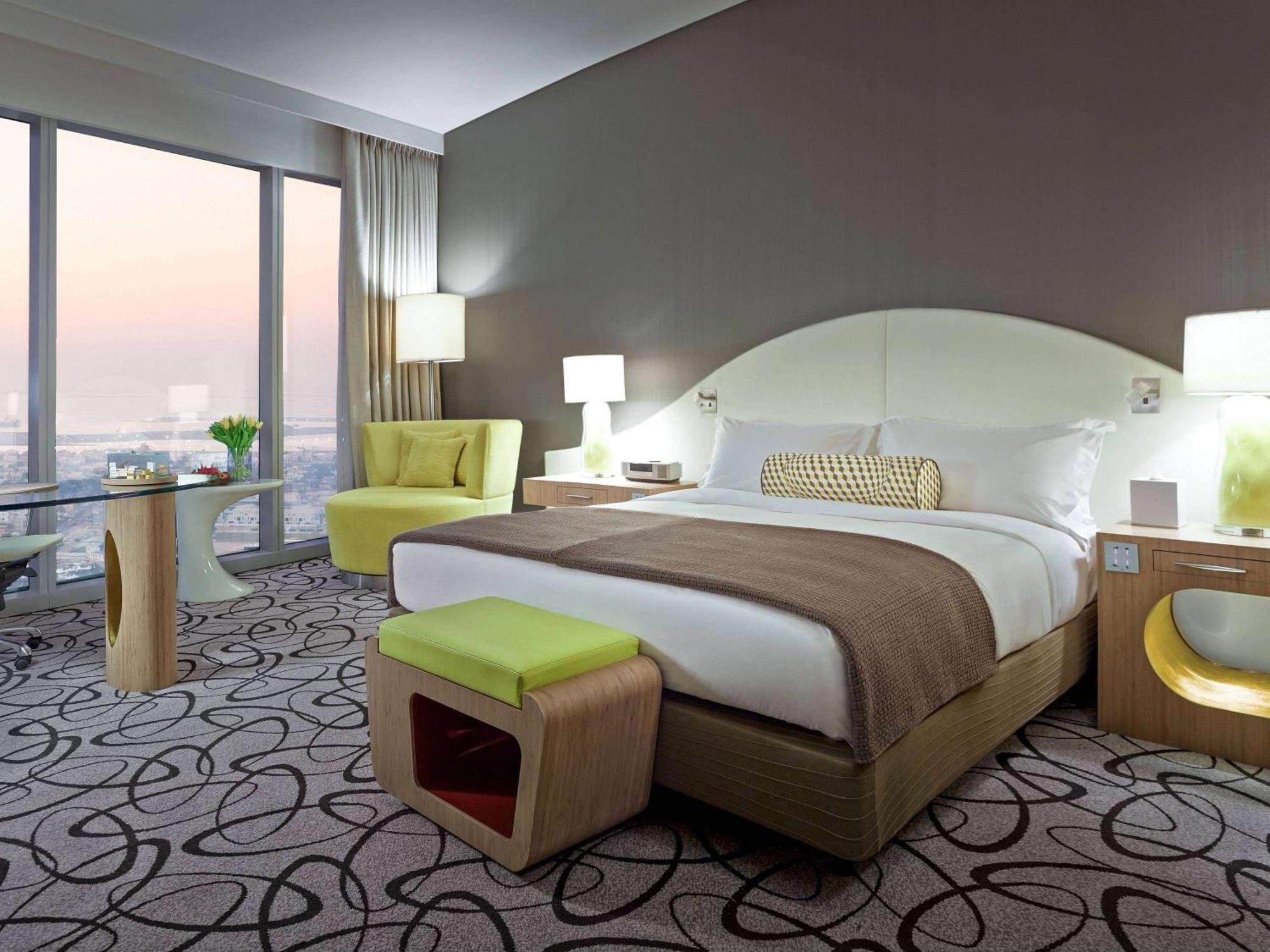 Sofitel Dubai Downtown Hotel Kültér fotó A bedroom at the hotel